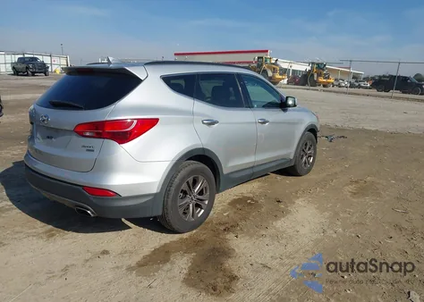 2014 Hyundai Santa Fe Sport 2.4L z USA, uszkodzony, nr VIN 5XYZUDLB3EG220704